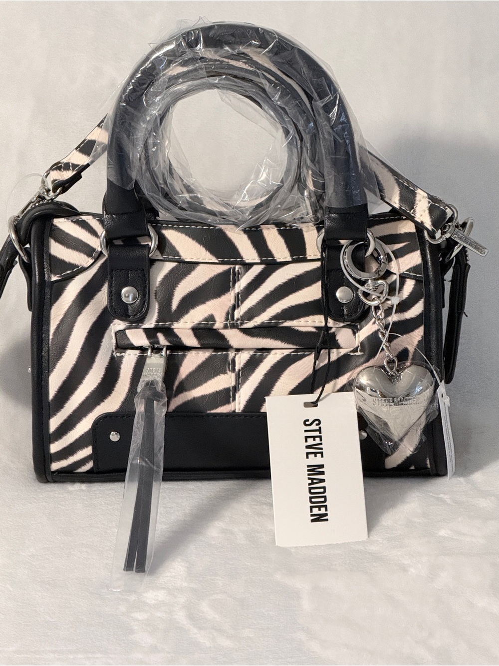 Steve Madden Zebra-Print Satchel in Black and Ivory with Heart Charm